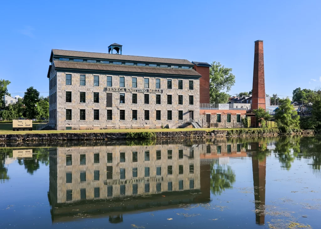 Seneca Knitting Mill reflected on a lake